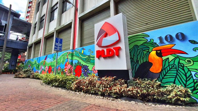 PLDT transforms Makati headquarters; creates mural on environmental stewardship